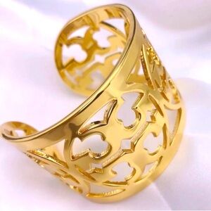 TORI BURCH•Gold Reva Wide Logo Cuff Bracelet.